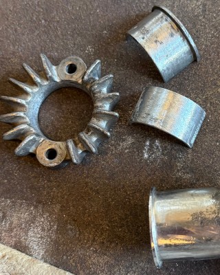 Here’s a photo of the parts I referenced. Nothing seems to fit and I’m not even certain in what order and which direction the flanges go. They also won’t fit inside the collar. Can someone tell me SPECIFICALLY how these are arranged and how to fit them into the exhaust port <br />  Thanks!