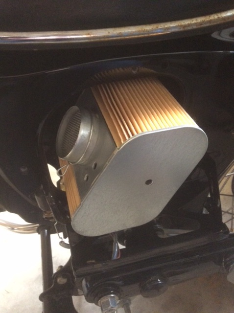 Inserting the air filter.