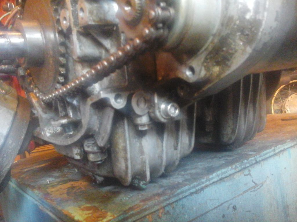 I fitted a 40 thou washer behind each of the starter mounting bolts.<br />Before the washers were fitted the chain was rubbing on the bottom of the case. I fitted a 8mm washer instead of a 6mm.